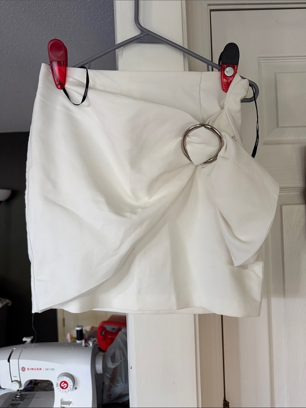 White Wrap-Style Mini Skirt with Ring Detail